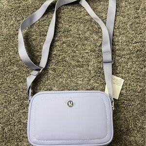 Lululemon purple crossbody camera bag
